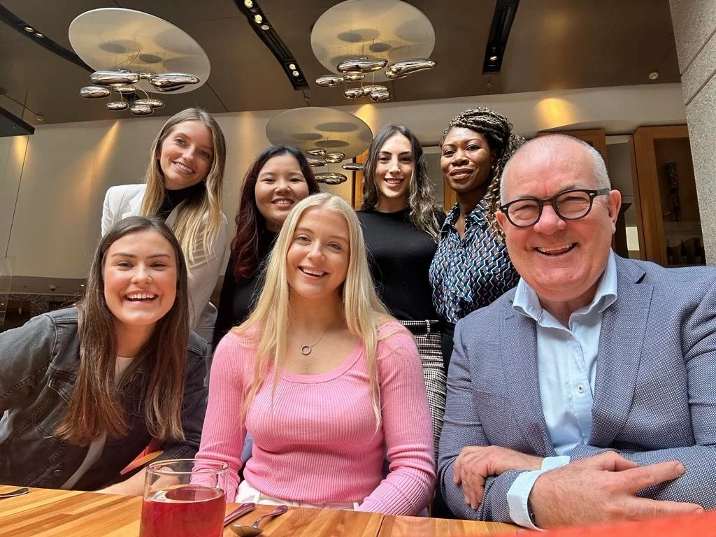 teamwork makes the dream work lunch offsite team photo
